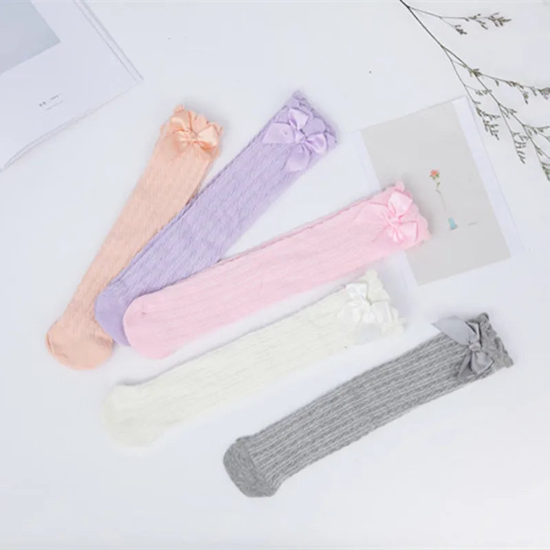 Girls’ Knee-High Bow Cartoon Socks — Ages 2–12