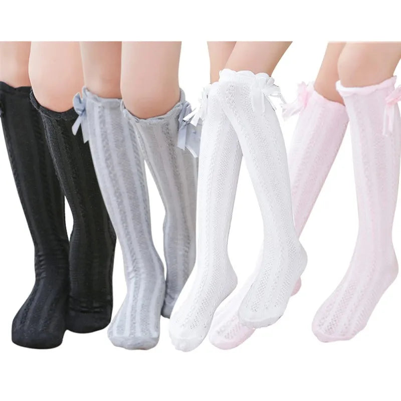Girls’ Knee-High Bow Cartoon Socks — Ages 2–12