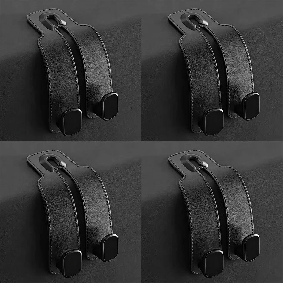 Four identical views of a black leather phone stand with a metal ring at the top and two black rubber feet, arranged in a 2x2 grid on a dark gray background.