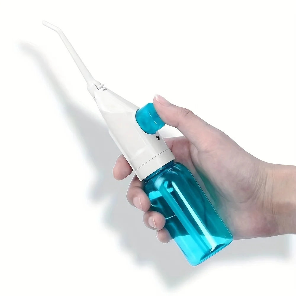 Cleaner Teeth. Healthier Gums. — Portable Manual High Pressure Oral Irrigator | Water Dental Flosser, Toothpick Jet, No Batteries, Pink, Blue & Black