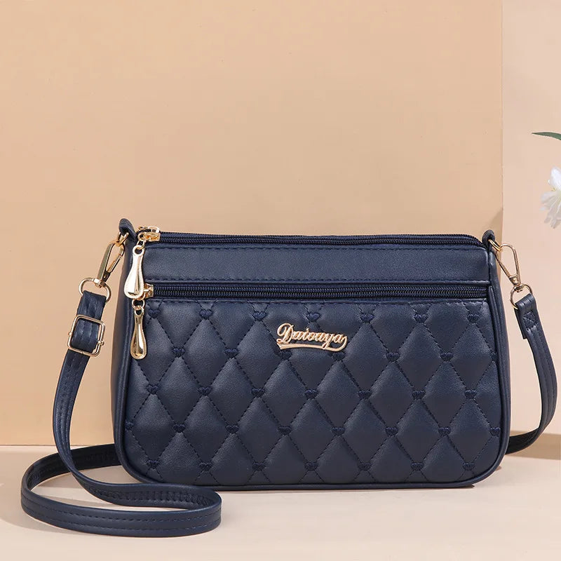 Embroidery Leather Messenger Bag – Women's Handbag with Hair Ball Charm in 12 Colors