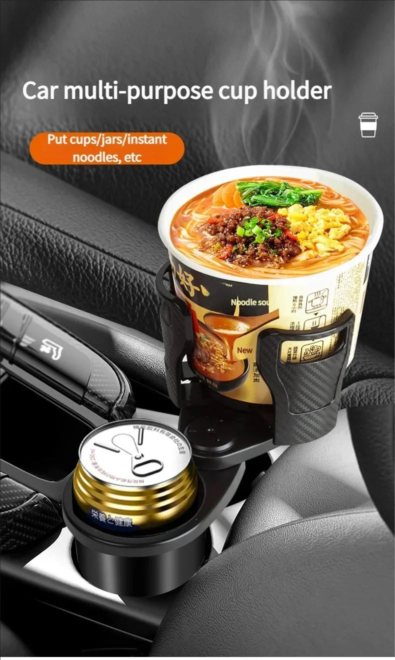A car multi-purpose cup holder shown installed in a car console, holding a cup of instant noodles and a small gold-and-black can holder. Text on the image says it can hold cups/jars/instant noodles, etc.