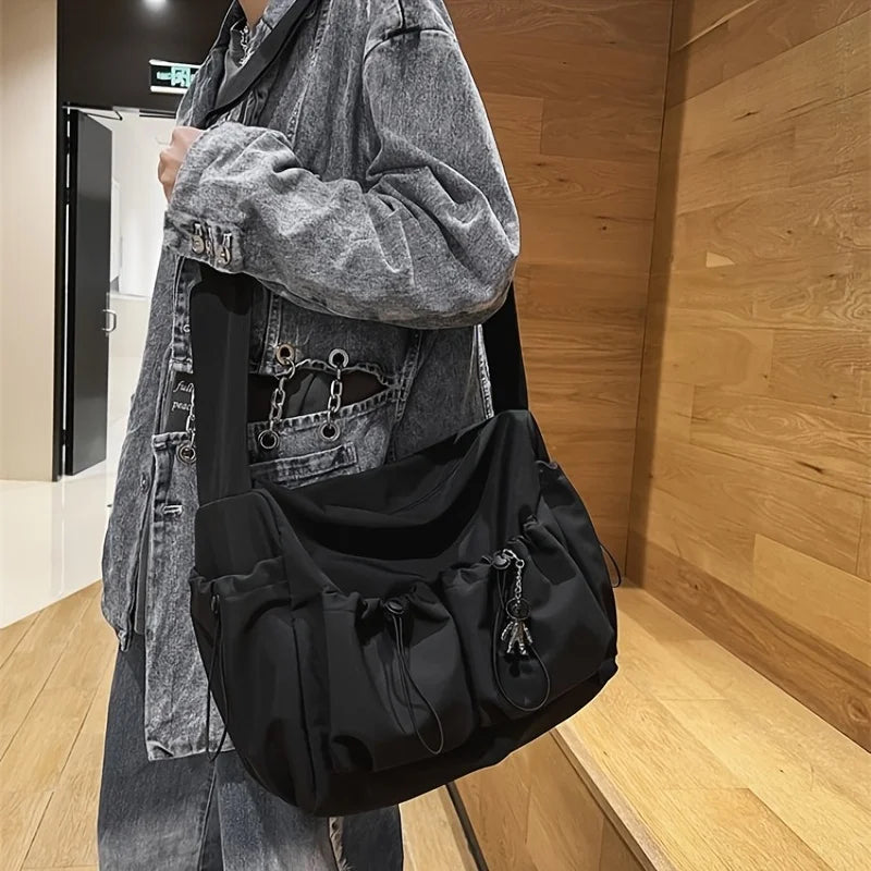 Fashionable Drawstring Crossbody Bag – Spacious Zipper Closure Shoulder Bag with Bag Charm