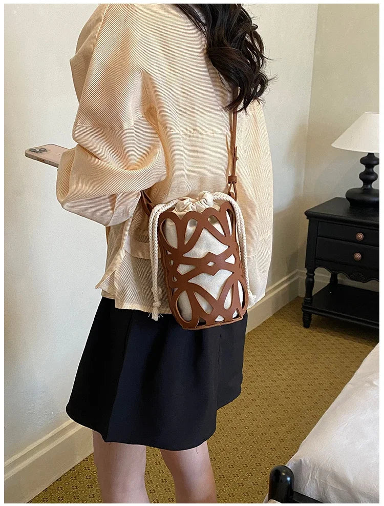 Brilliant Fish Hollow Out Drawstring Mini Bucket Crossbody Bag – Adjustable Strap Shoulder Bag for Women