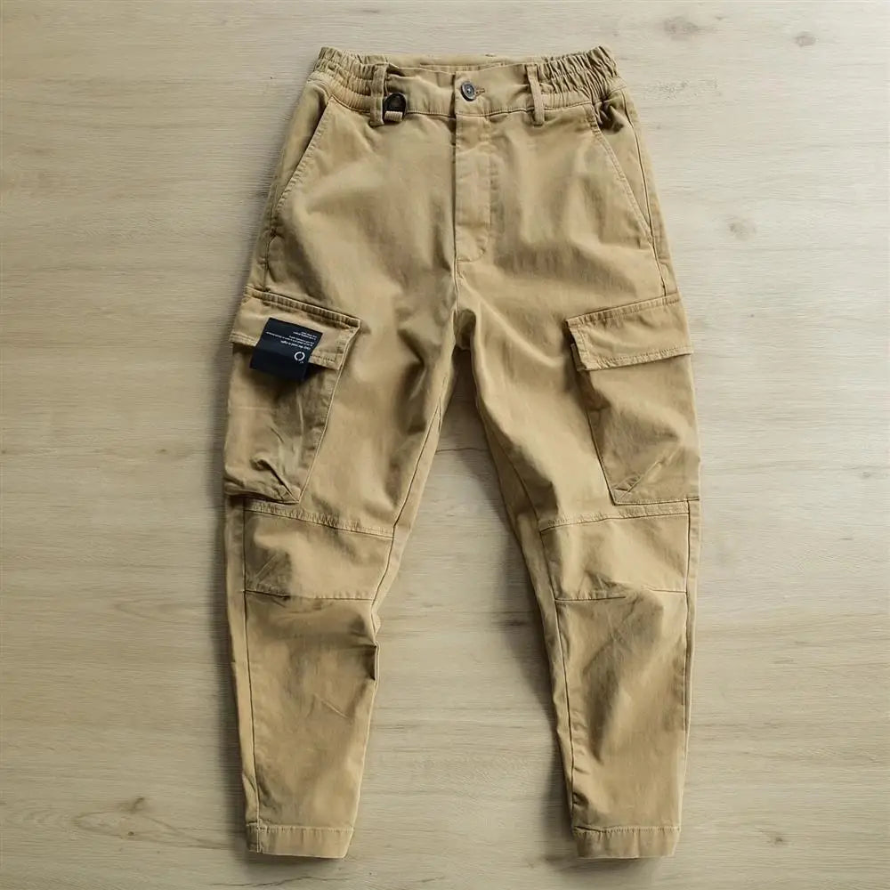 Beige cargo pants on a wooden floor