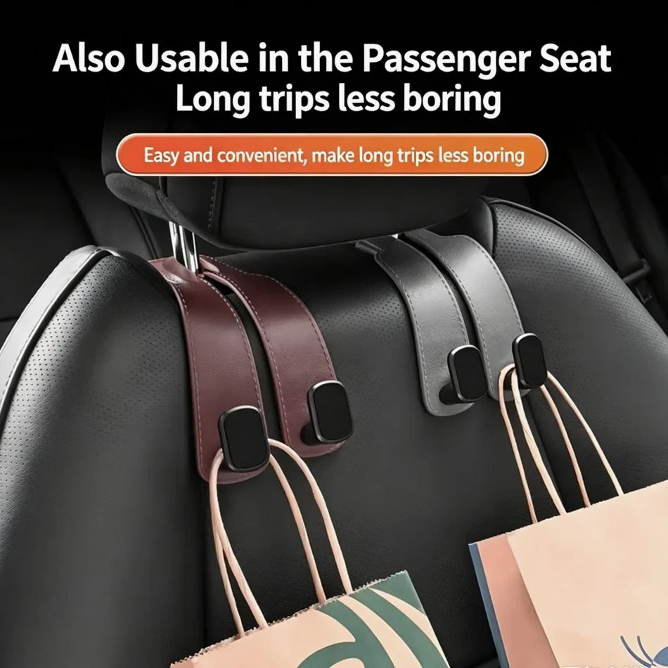 Two car seat strap organizers hanging from a black car seat, one in burgundy and one in dark gray, each holding shopping bags. Text at the top reads 'Also Usable in the Passenger Seat Long trips less boring'.