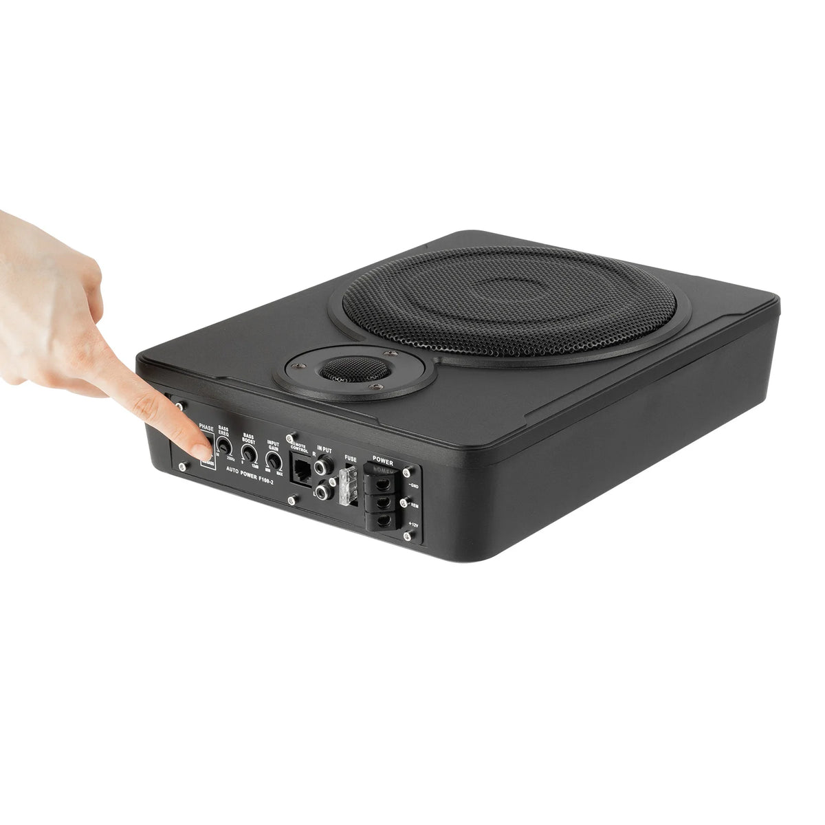 Black audio subwoofer with a hand pointing at it on a white background