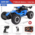 Blue and black remote control off-road RC truck with large knobby tires, shown with its controller, USB charging cable, and orange color box on a white background with dimension labels and text indicating 1*500mAh Battery + Color box.