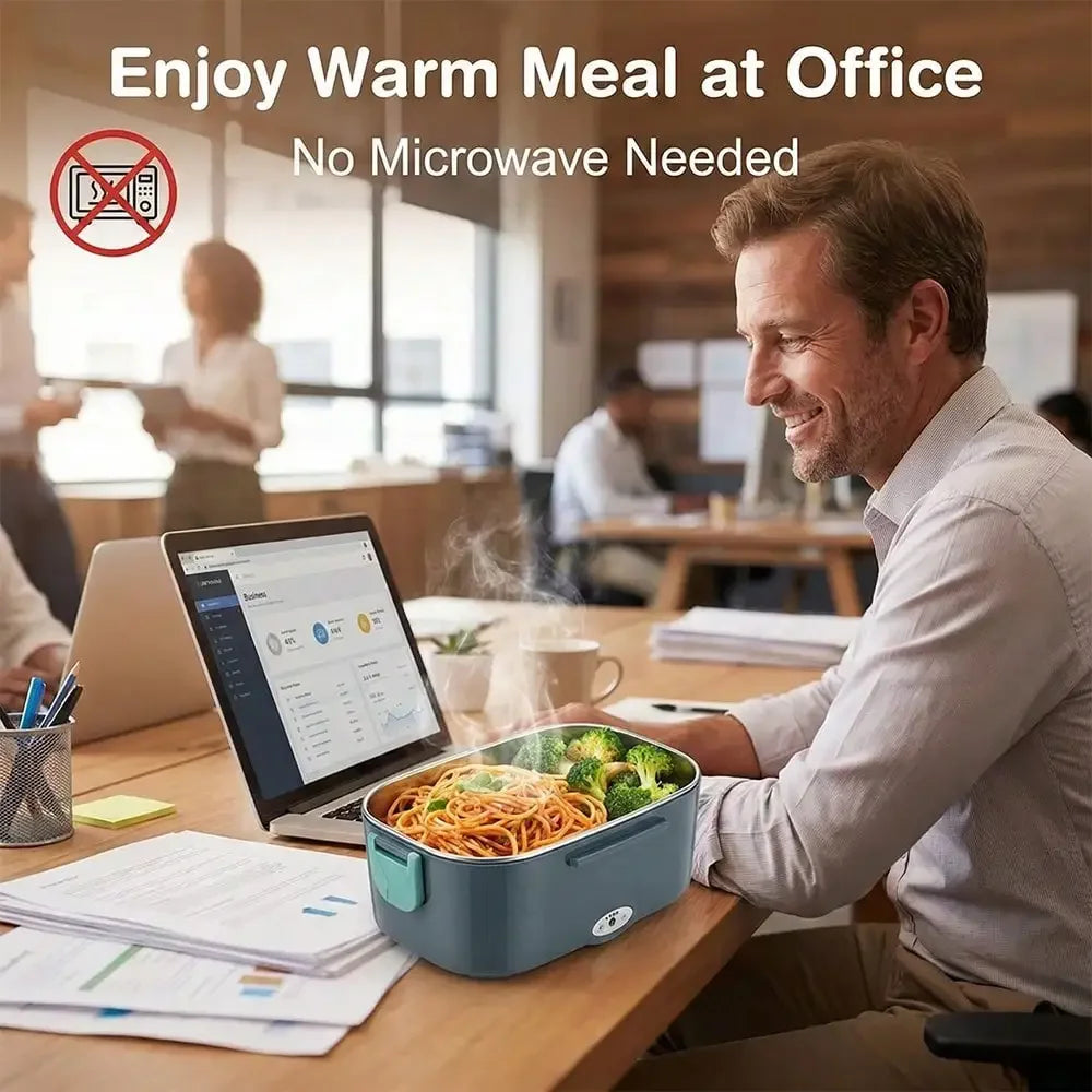 Man enjoying a warm meal at his desk with a portable heating device, no microwave needed.