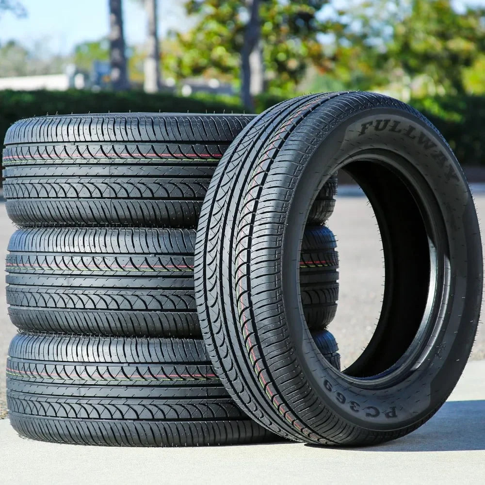 Stack of tires with a blurred outdoor background