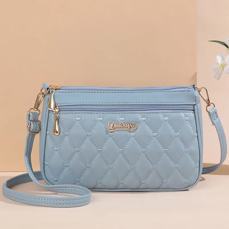 Embroidery Leather Messenger Bag – Women's Handbag with Hair Ball Charm in 12 Colors