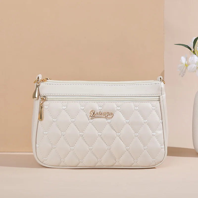 Embroidery Leather Messenger Bag – Women's Handbag with Hair Ball Charm in 12 Colors