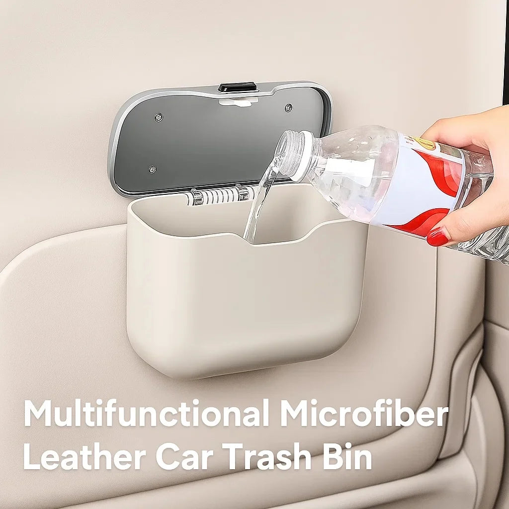 A car interior-mounted trash bin with a hand pouring water from a clear plastic bottle into the bin. The product is shown attached to a beige leather car door, with text at the bottom reading 'Multifunctional Microfiber Leather Car Trash Bin'.