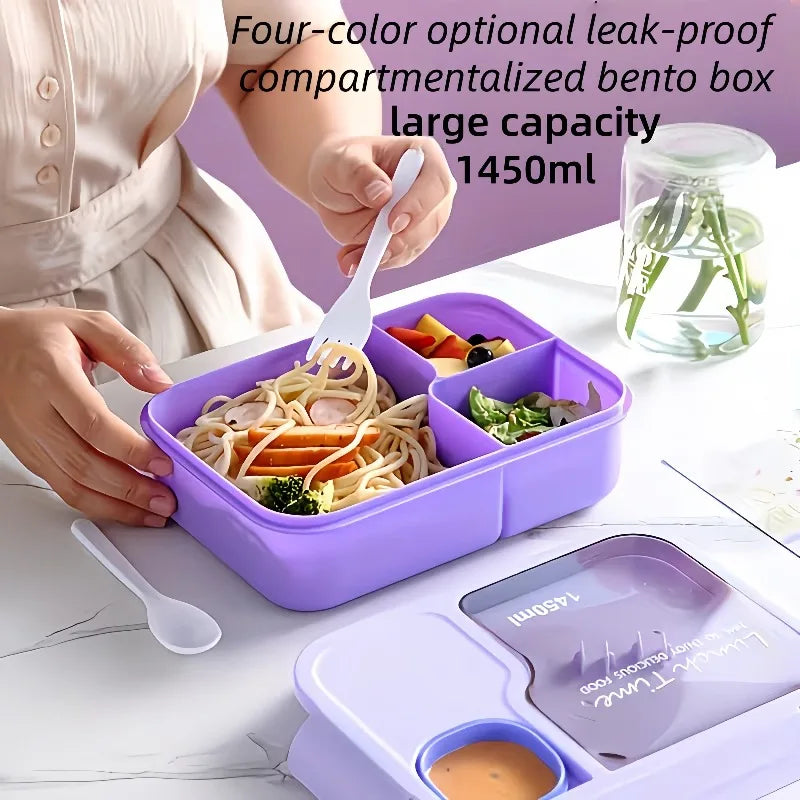A purple compartmentalized bento box with a lid and small cup, shown on a white marble surface with food inside. A person is holding a white spoon over the box.