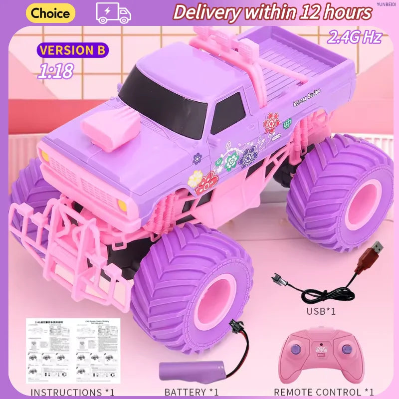Purple and pink remote control monster truck toy with large off-road tires, shown with a USB charging cable, pink remote control, battery, and instruction manual on a light pink background.