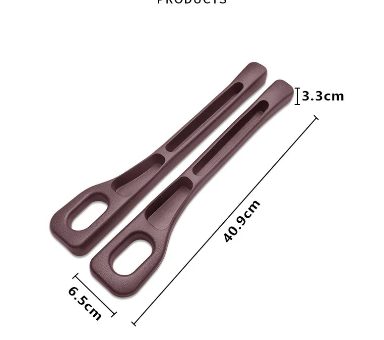 Two brown plastic straps with measurements on a white background