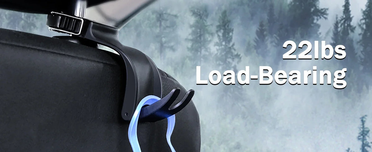 A close-up of a black car seat belt clip holding a blue seat belt, with large white text reading '22lbs Load-Bearing' over a blurred forest background.