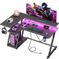 Premium 40 Inch Gaming Desk with Power Outlet & LED Lights, L Shaped Computer Gaming Table with 3 Tiers Storage Shelves, Corner