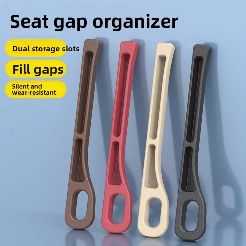 Four seat gap organizers in brown, pink, cream, and dark gray, standing upright against a light blue background with promotional text on the left.