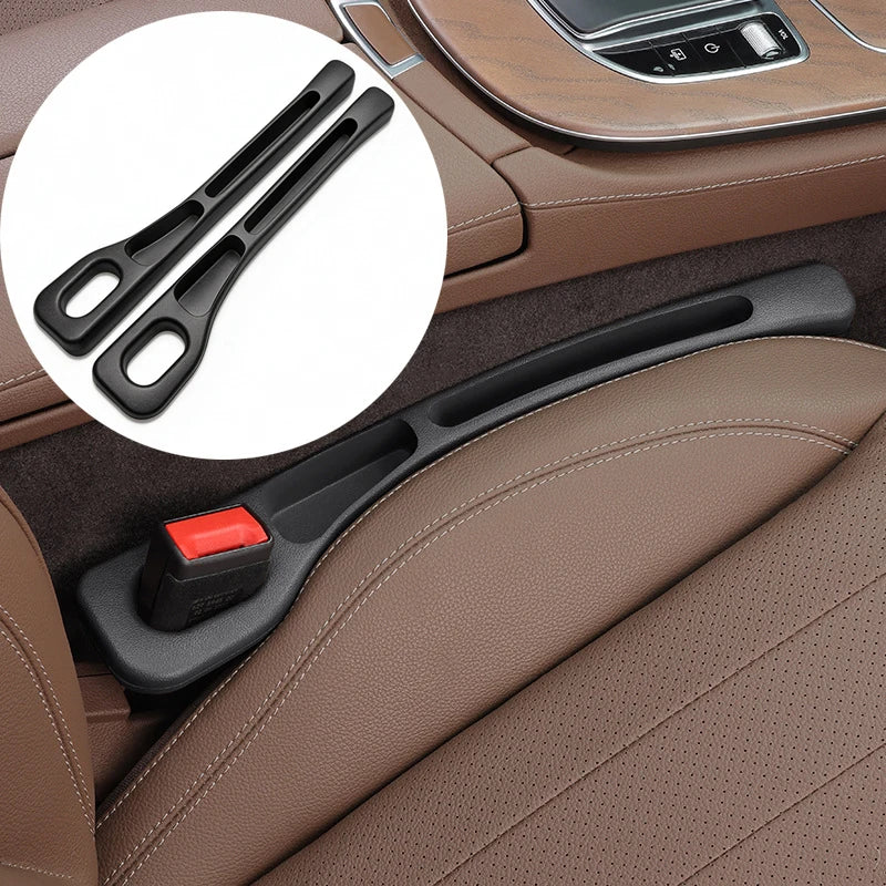 Black plastic car center console accessory shown installed in a brown leather car interior, with a circular inset showing the pair of long slim clips.
