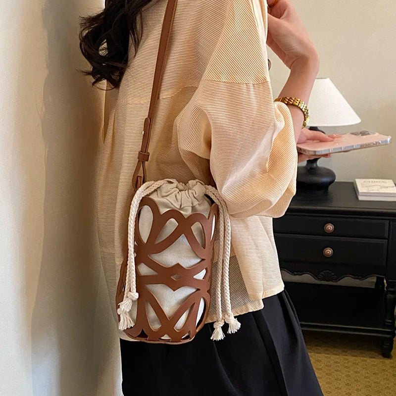 Brilliant Fish Hollow Out Drawstring Mini Bucket Crossbody Bag – Adjustable Strap Shoulder Bag for Women