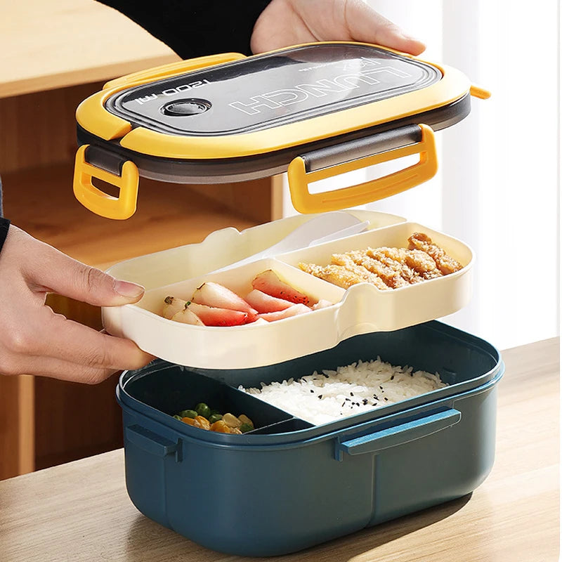 Multilayered lunch box with compartments on a wooden surface