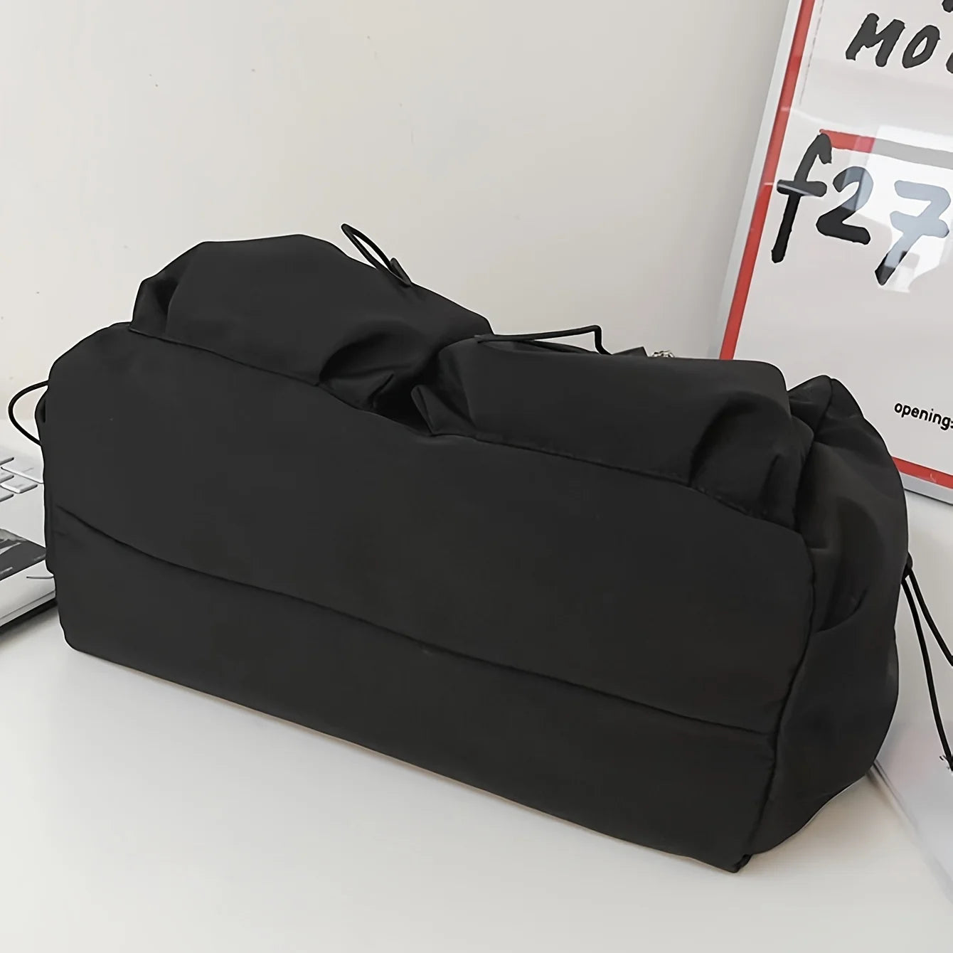 Fashionable Drawstring Crossbody Bag – Spacious Zipper Closure Shoulder Bag with Bag Charm