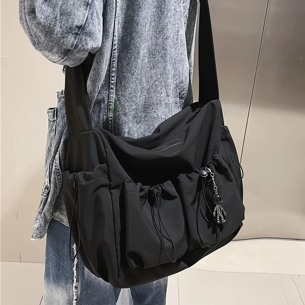 Fashionable Drawstring Crossbody Bag – Spacious Zipper Closure Shoulder Bag with Bag Charm